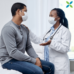 Doctor helping a patient 